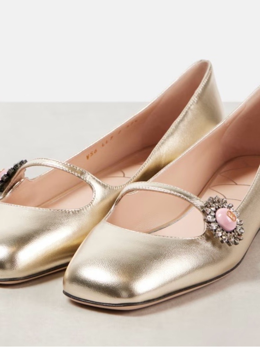 Valentino Garavani Metallic Gold Mary Jane Flats with Pink Enamel Crystal Brooch